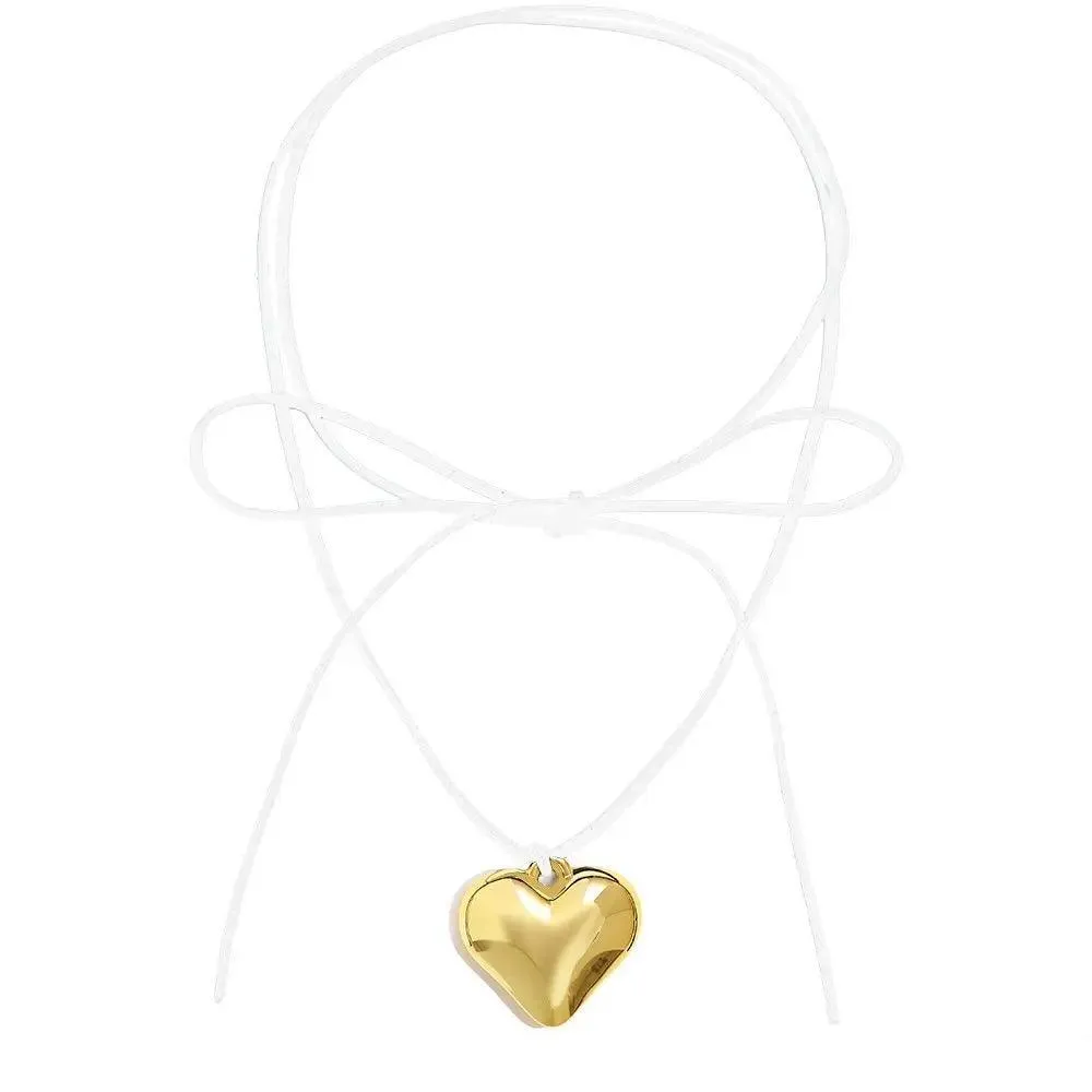 Heart Velvet Choker Necklace: Gothic Bow Detail for Edgy Style