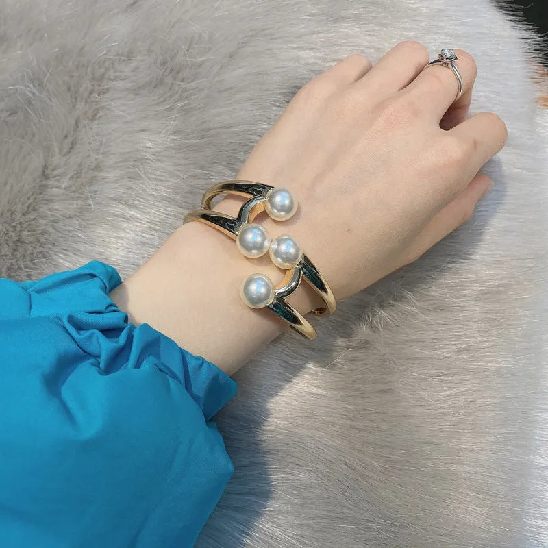 Mystique Pearl Bracelet - Exquisite Metal Bangle with Edgy Charm