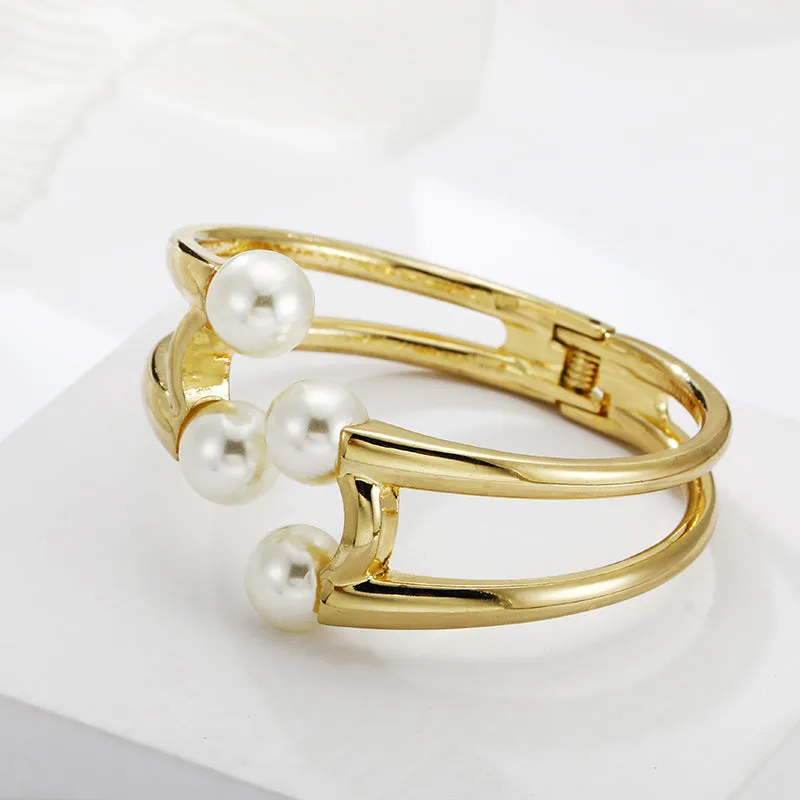 Mystique Pearl Bracelet - Exquisite Metal Bangle with Edgy Charm