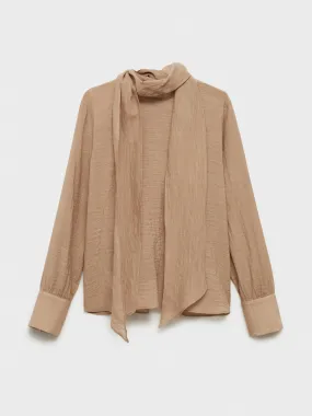 Textured blouse with bow